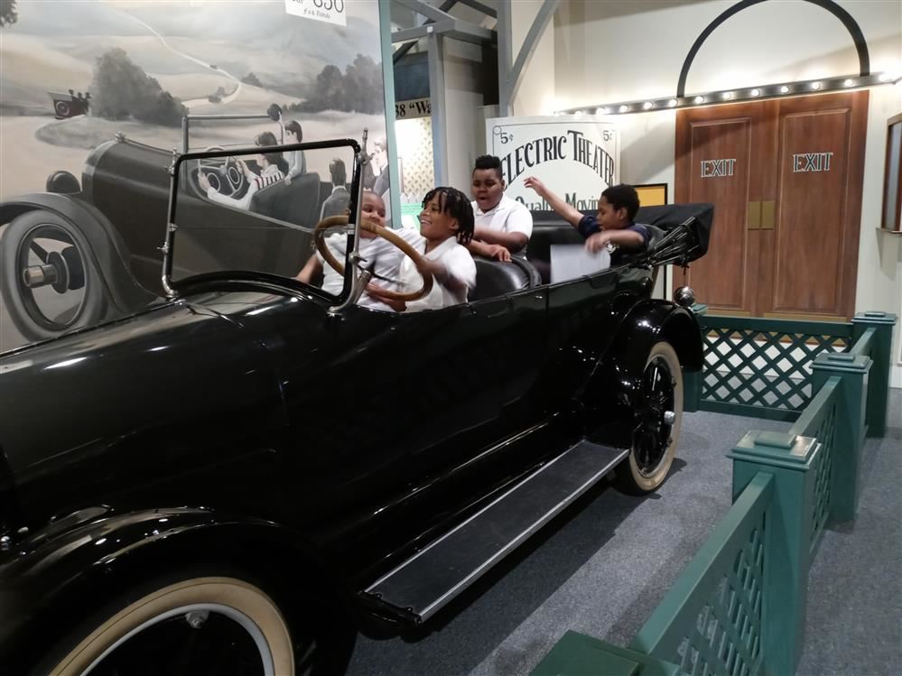  5th grade students in car